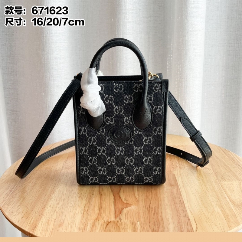 G*u*i top handle bags